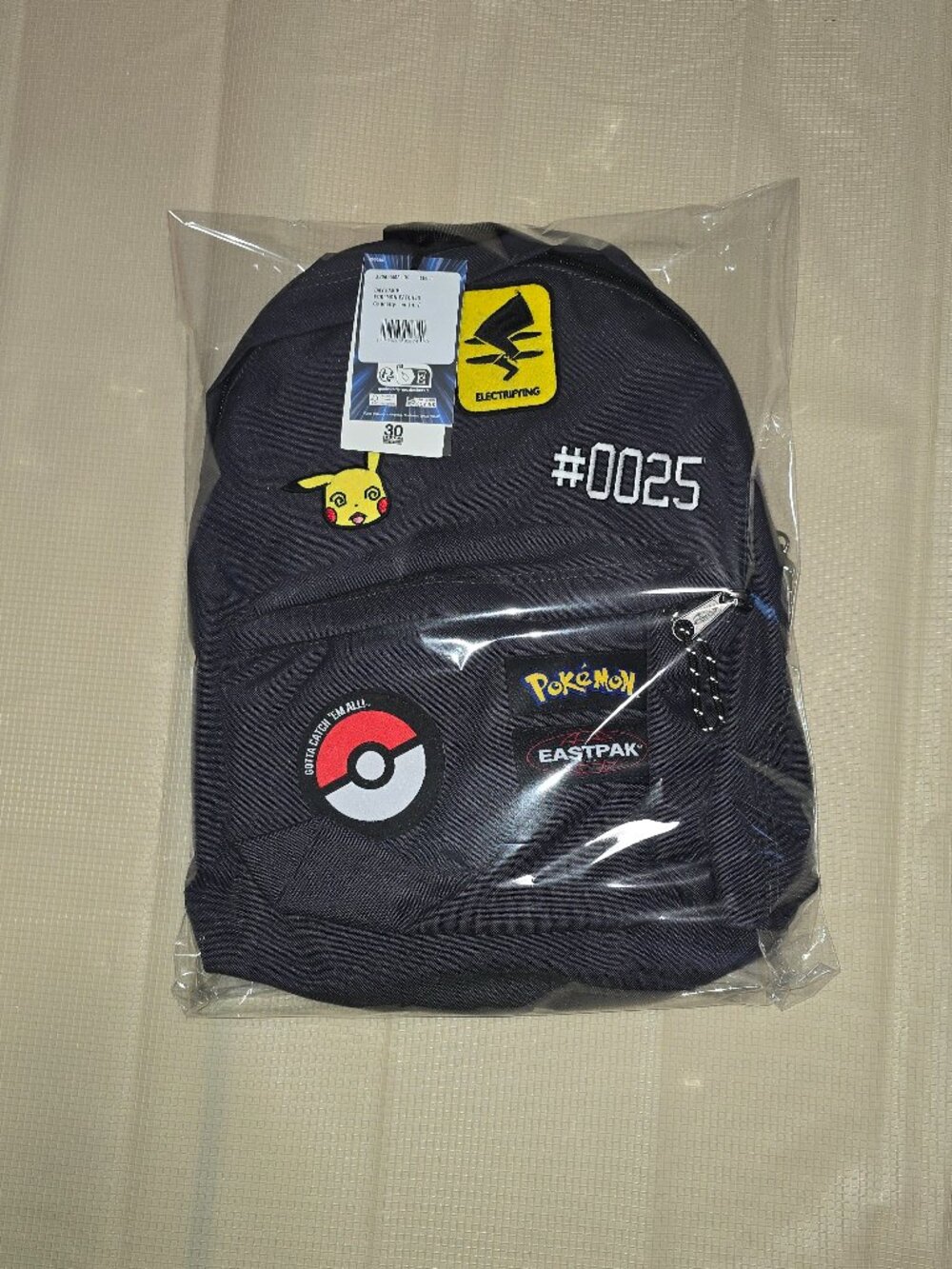 Pokemon x Eastpak Day Pak'r Patches Grey 24L Backpack 30 Year Anniversary